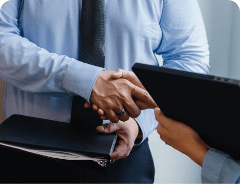 A man shaking hands with a woman
